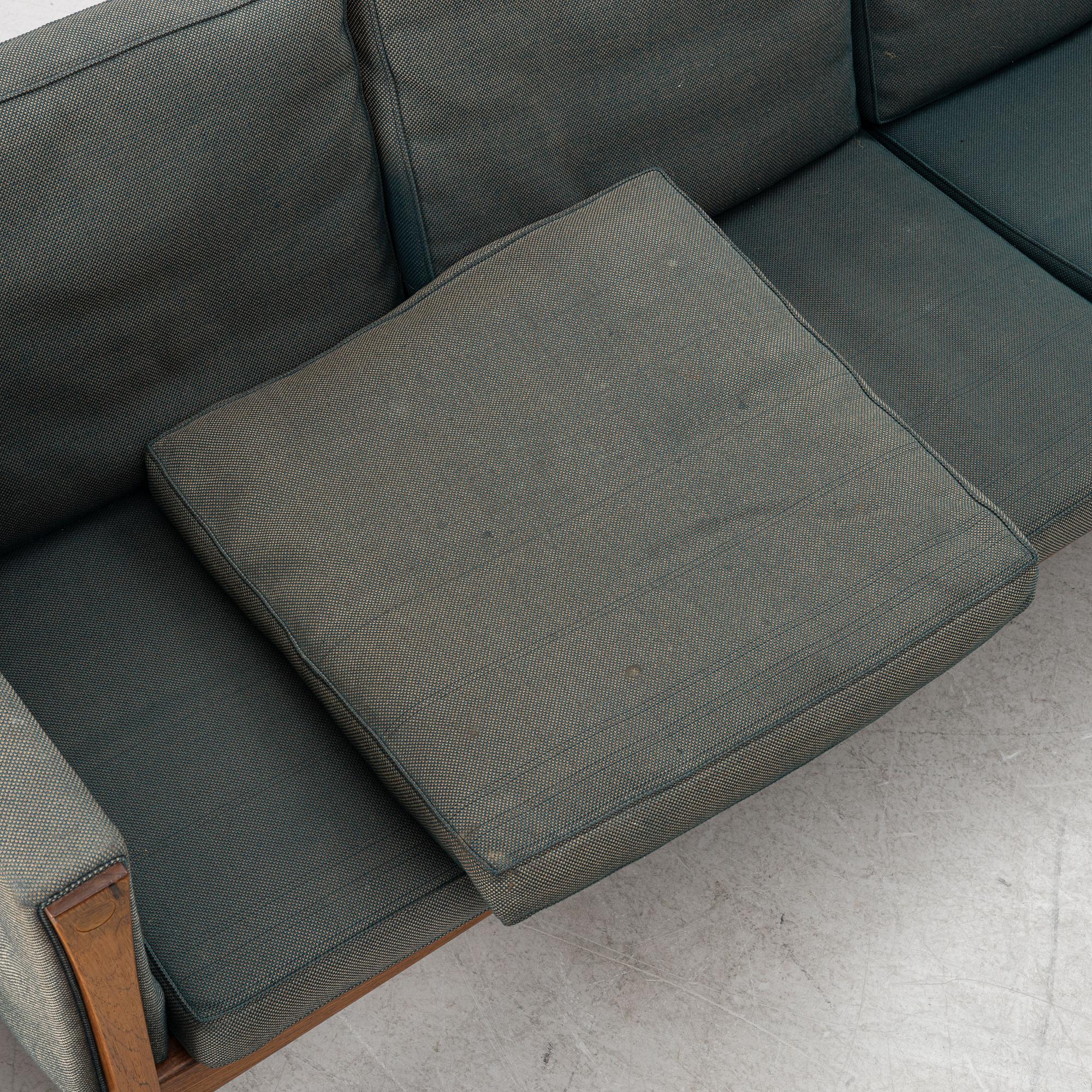Hans J. Wegner, a model AP62/4 sofa and model AP62/1 armchiar,
