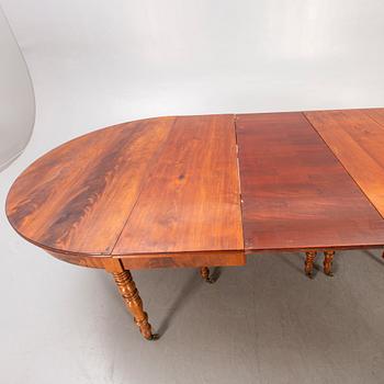 A Neo Renaissance mahogany dining table later part of the 19th century.