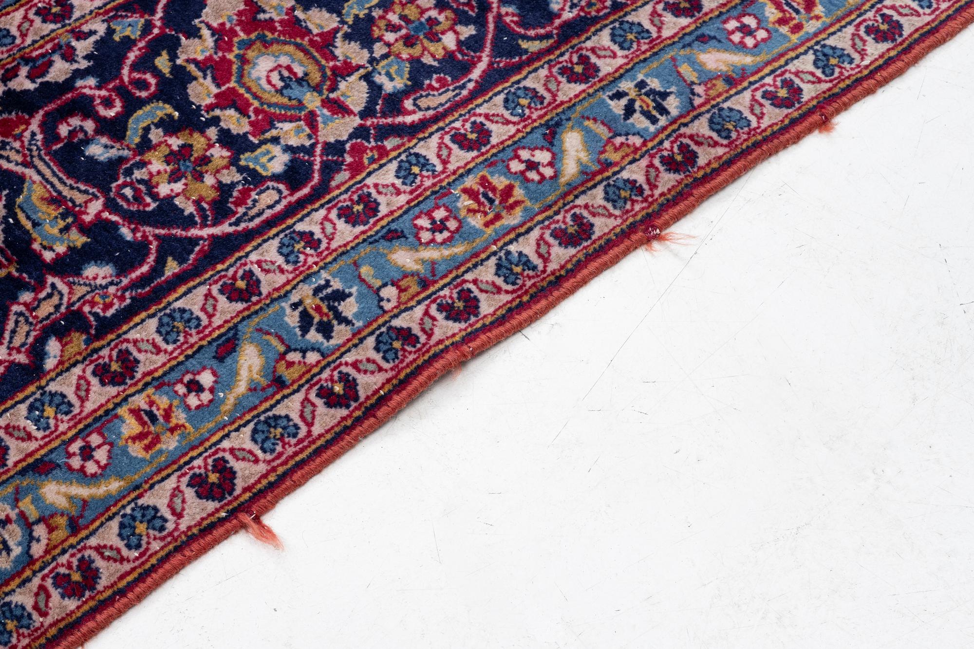 A Keshan carpet, c. 403 x 290 cm.