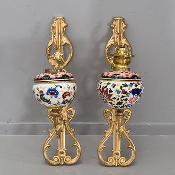A pair of wall paraffin lamps, turn of the century 1900. Made by Ljungdells Malmö Sweden.