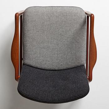 Finn Juhl, a "Bo59" teak easy chair, Bovirke Denmark, 1950-60's.