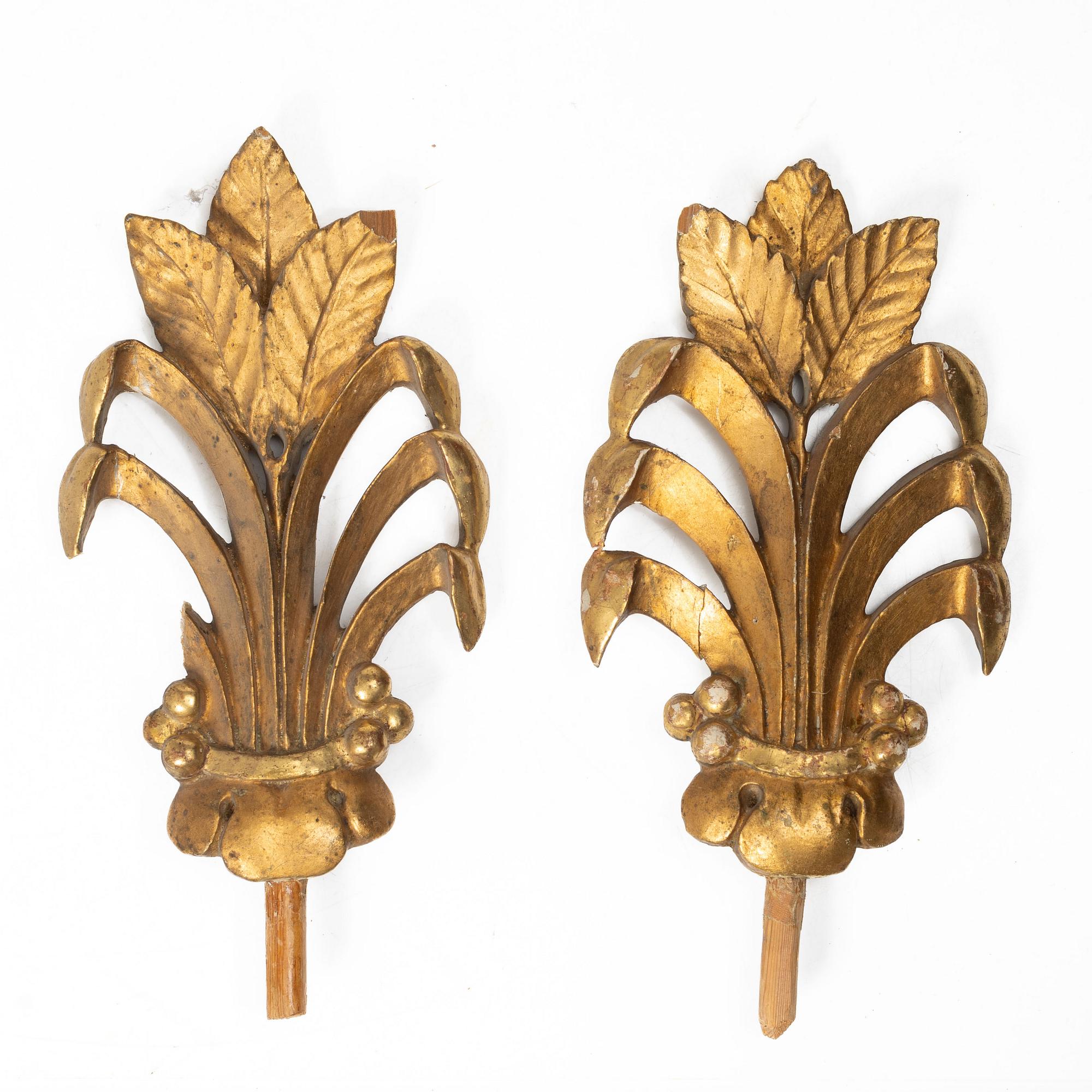 Two pairs of curtain-rod finials, early 19th Century.