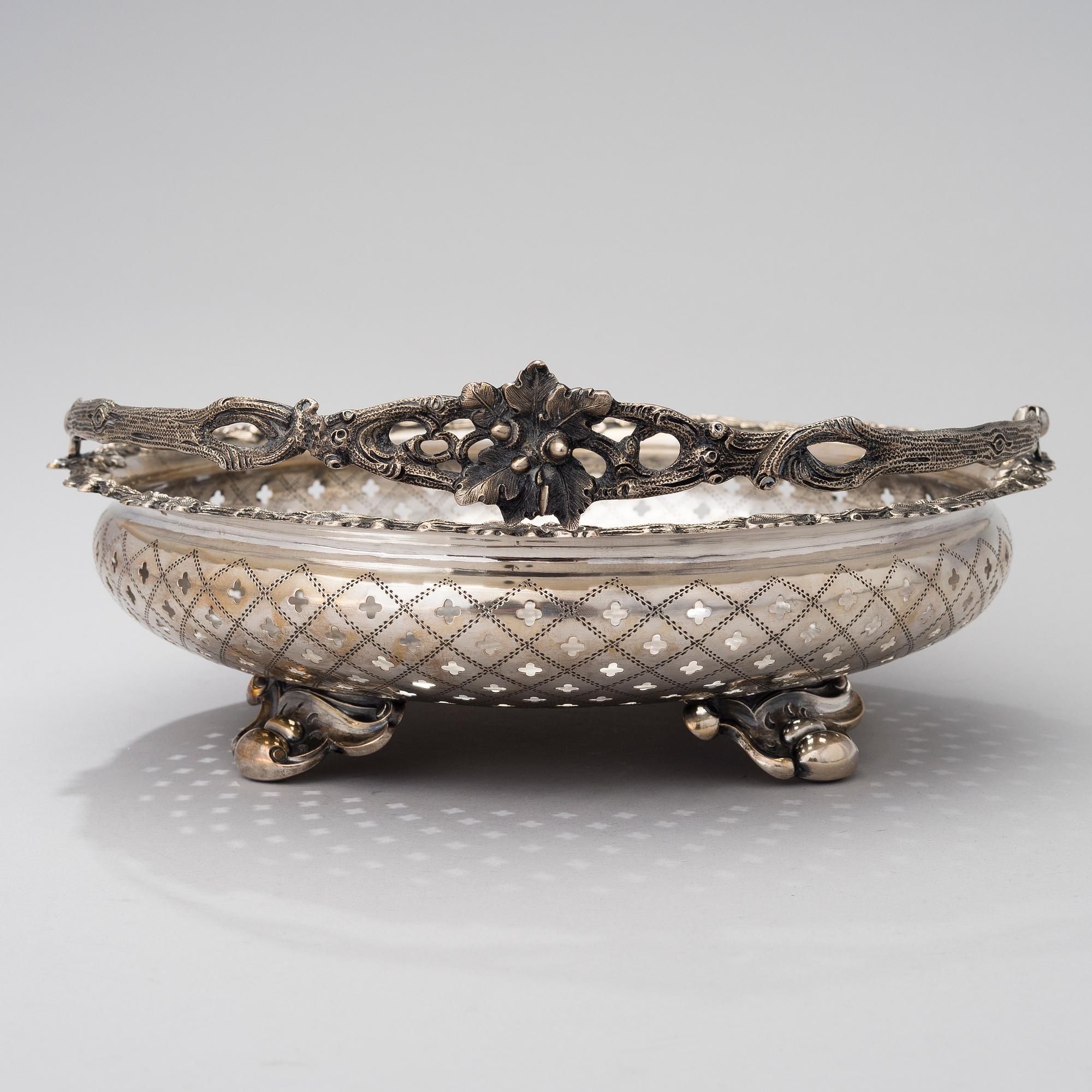 A SILVER SWING HANDLE BASKET, Germany late 19th century, controll marks Soviet Union, 20th century, weight 694 g.