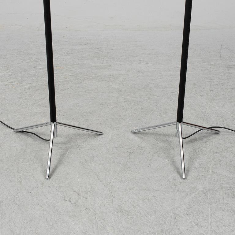Three contemporary floorlamps by Santa & Cole.