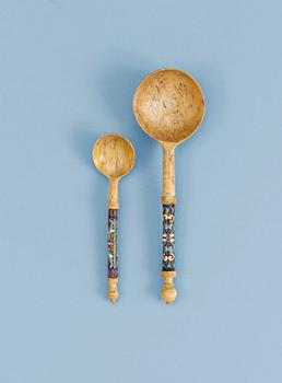 TWO RUSSIAN ENAMEL AND BIRCH SPOONS, marked S:t Petersburg 1899-1908.