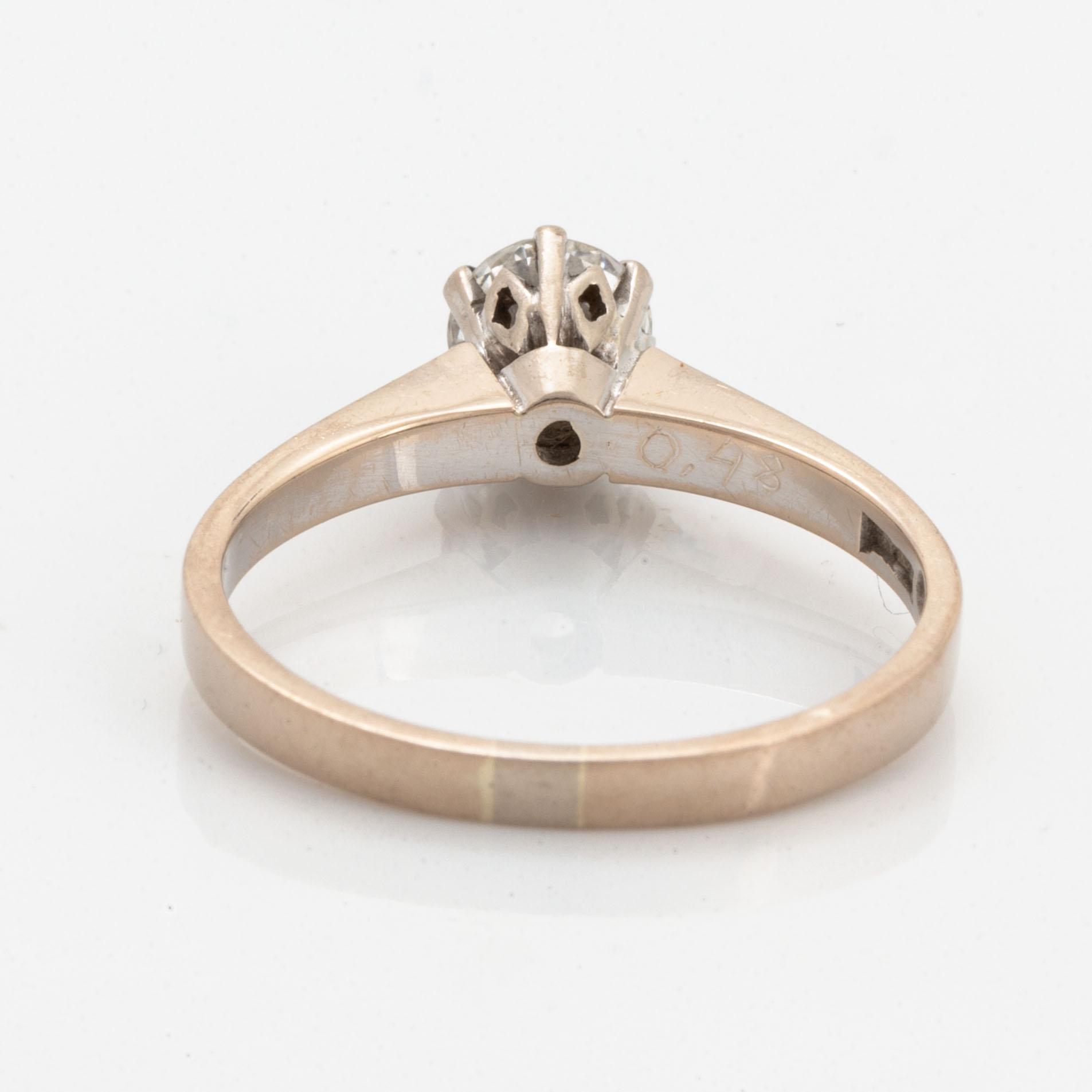 Brilliant-cut diamond solitaire ring.