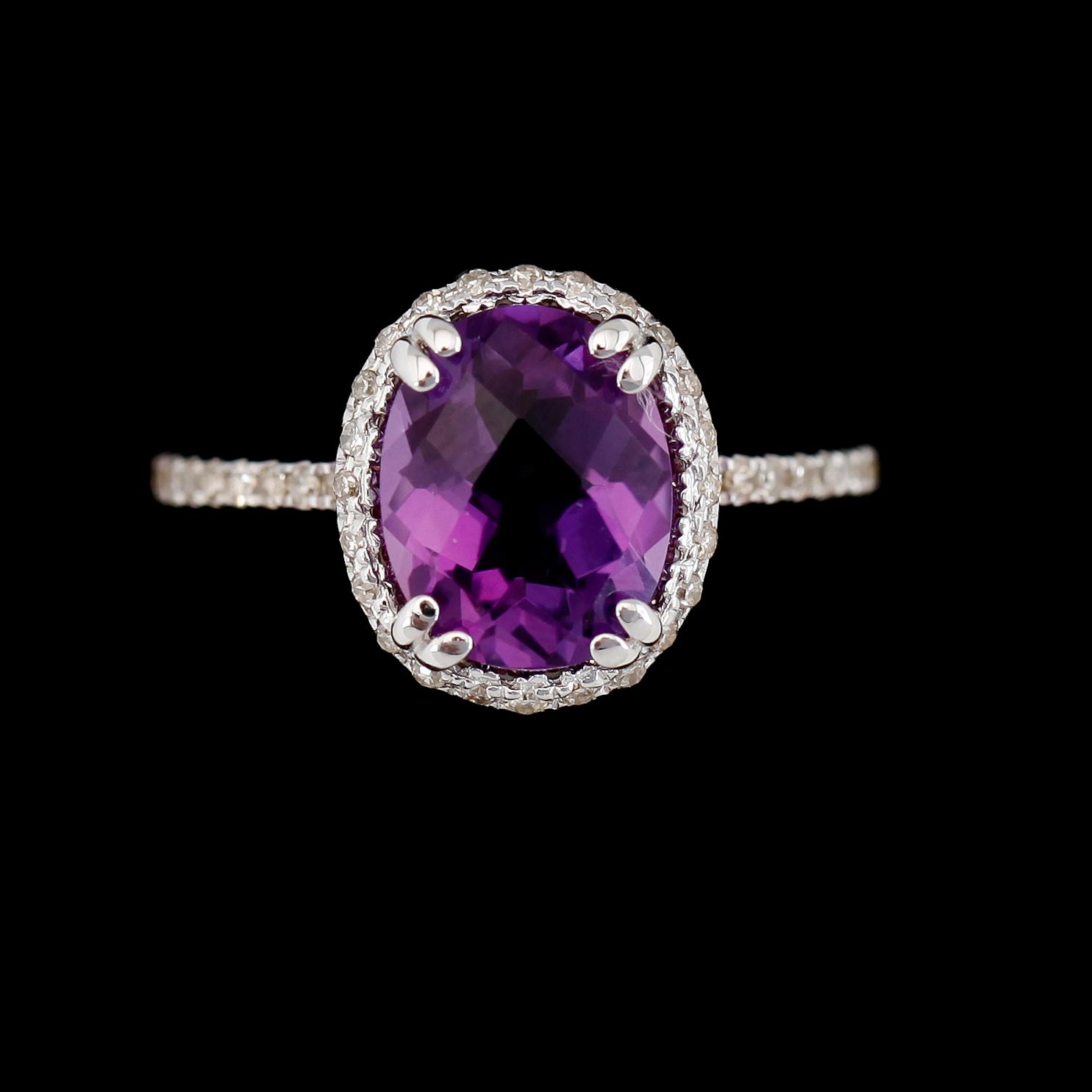 RING, 10K vitguld, diamanter tot ca 0.50 ct. och ametist.