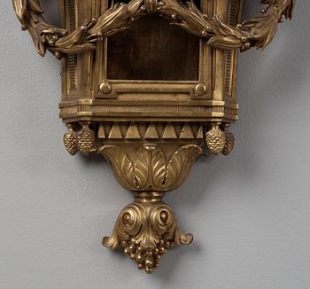 A Louis XVI late 18th century gilt bronze wall clock.