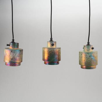 Tom Dixon, a set of three stoneware “Lustre pendants”.