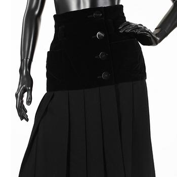YVES SAINT LAURENT, a black skirt.