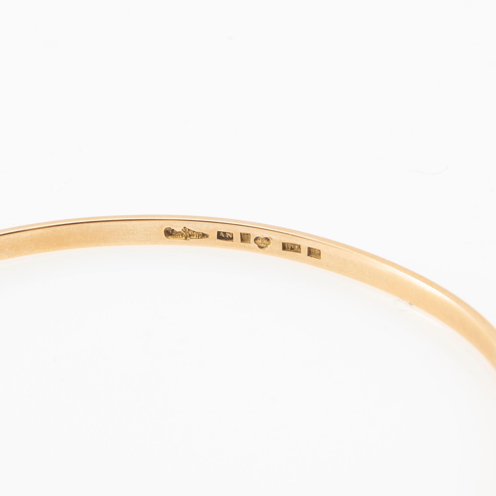 Wiwen Nilsson, Armring 18K gold with a synthetic white spinel, Lund 1967.
