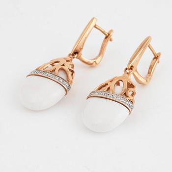 A pair of brilliant cut diamond and white agate earrings.