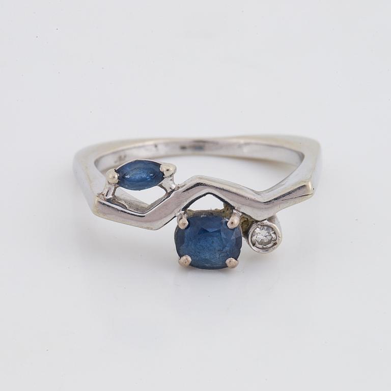 Navette and oval sapphire and diamond ring.