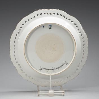 A set of three Royal Copenhagen 'Flora Danica' serving dishes and a sauce boat, Denmark, 20th Century.