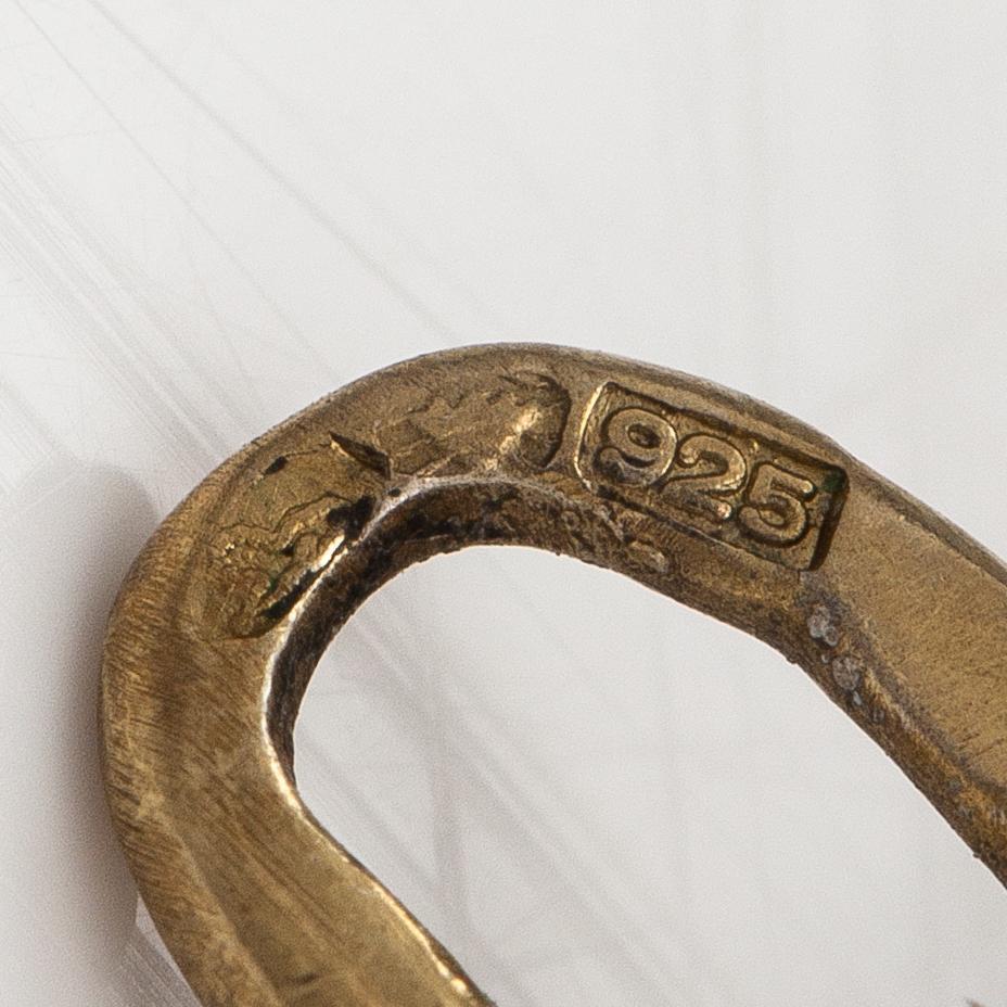 An egg pendant made of sterling silver and enamel. Import marked Kultakeskus, Helsinki.