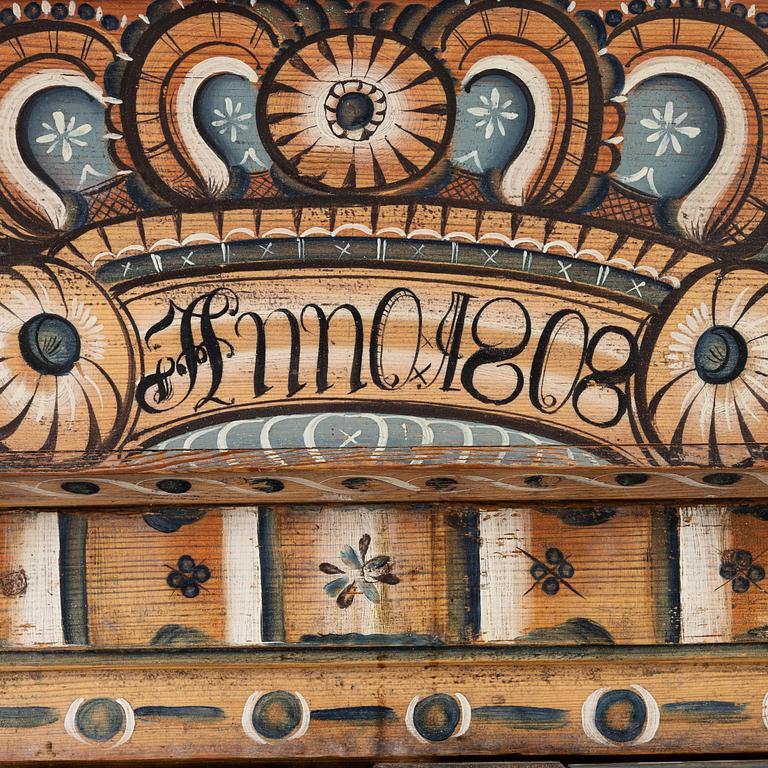 A Swedish Dalecarlian folk art cabinet dated 1808.