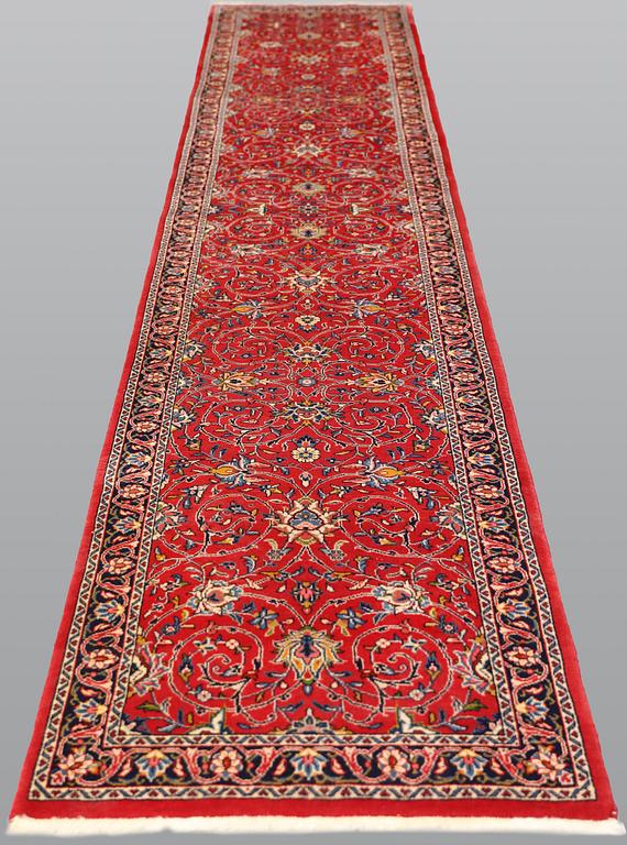 A Sarouk runner, c. 425 x 79 cm.