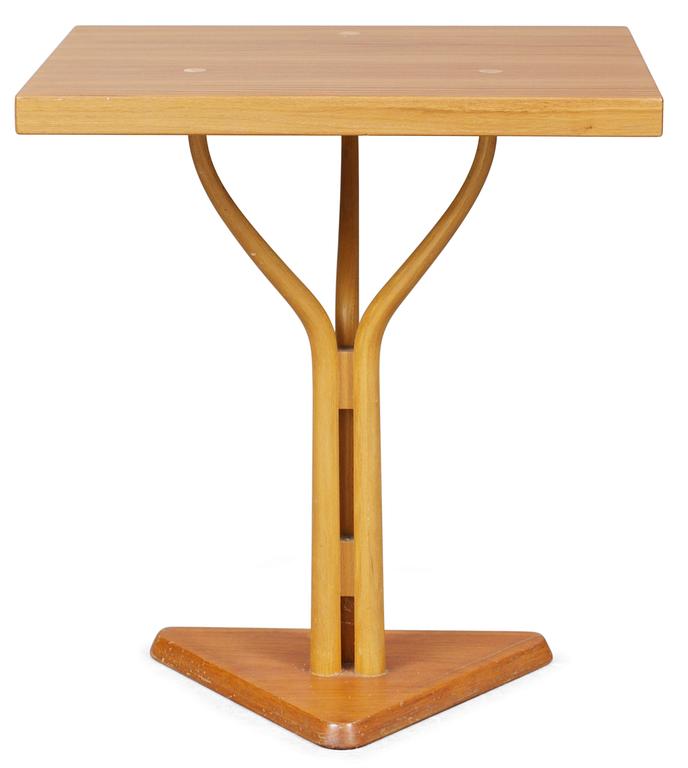 A Carl- Axel Acking oregon pine table by Nordiska Kompaniet for the Hotel Malmen ca 1949-51.