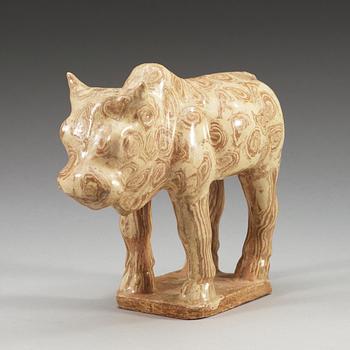 A glazed pottery figure of an ox, Tang dynasty (618-907).