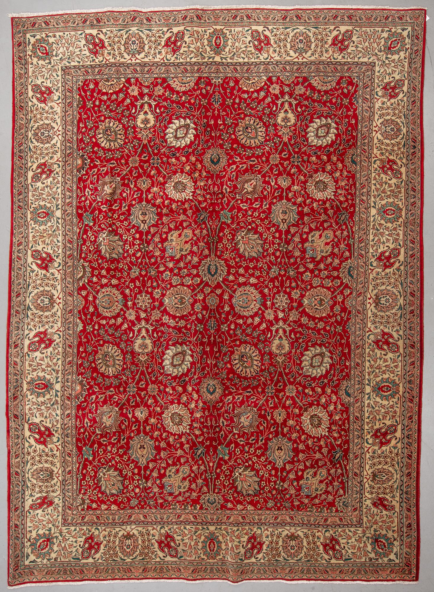 A carpet, Tabriz, ca 406 x 300 cm.