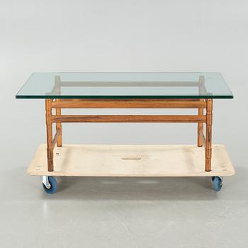 A 1960s sofa table.