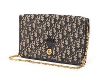 524. A black monogram canvas evening bag by Christian Dior.