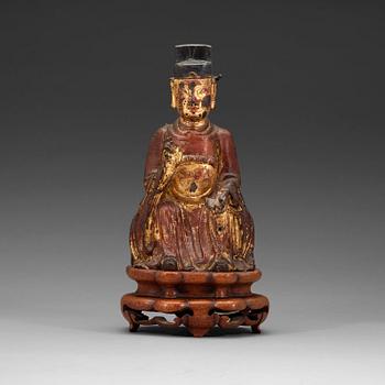 101. A seated figure of a daoist dignitary, Ming dynasty (1368-1644).