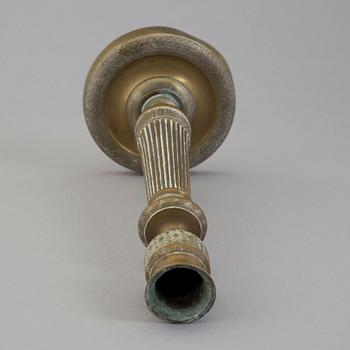 A first half of the 19th century Empire bronze candlestick.