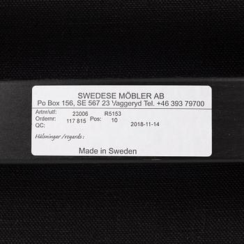 Yngve Ekström, a  'Lamino' easy chair with foot stool, Swedese, 2018.