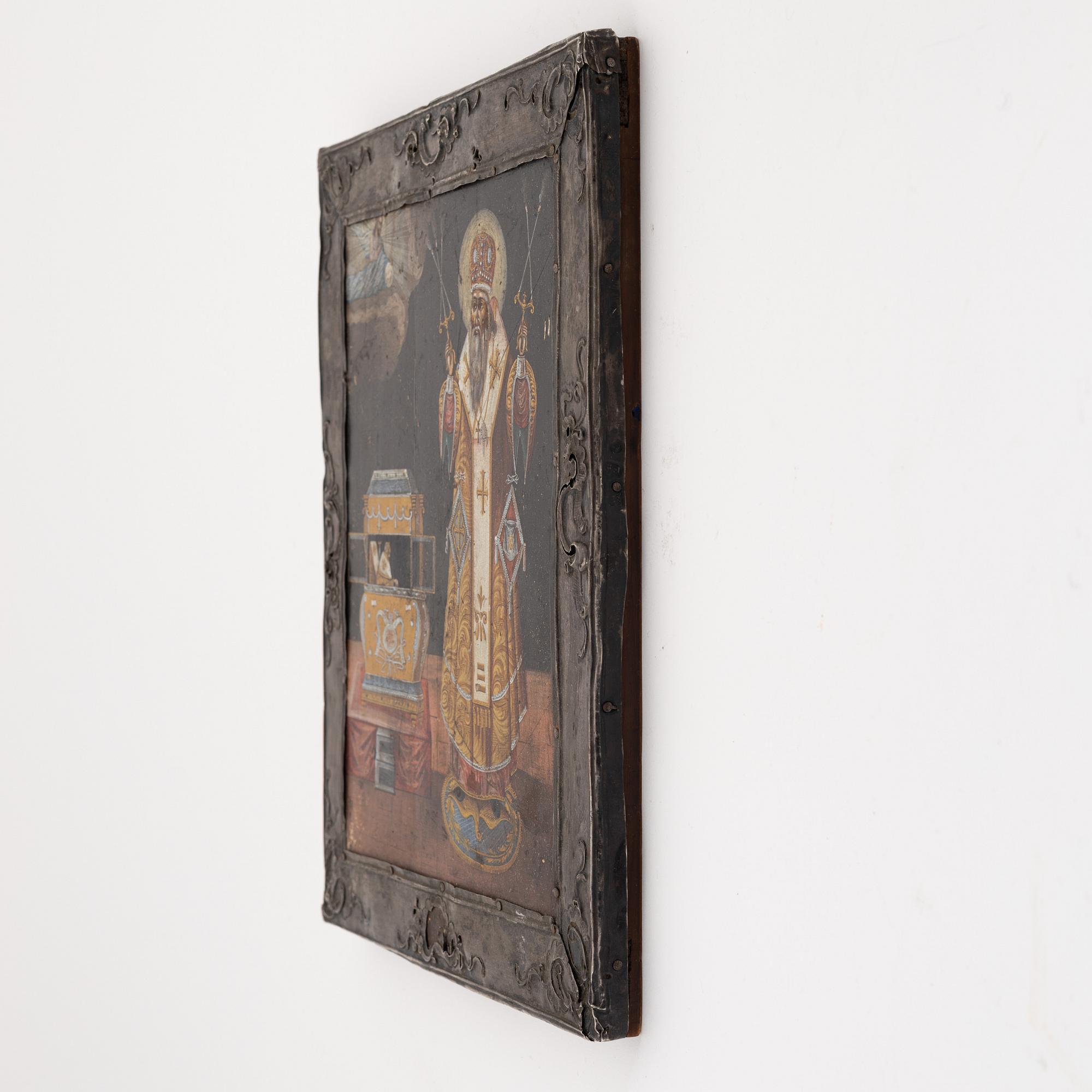 A silver and tempera on wood icon, Moscow 1776.