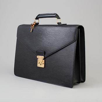 a "Serviette conseiller ambassadeure Epi" bag by LOUIS VUITTON.
