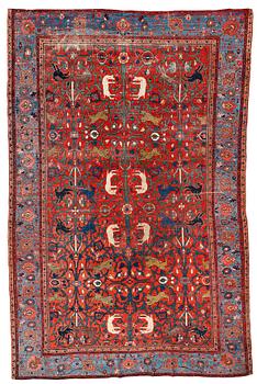 306. A CARPET, an antique West Persian figural, ca 409,5 x 269 cm.