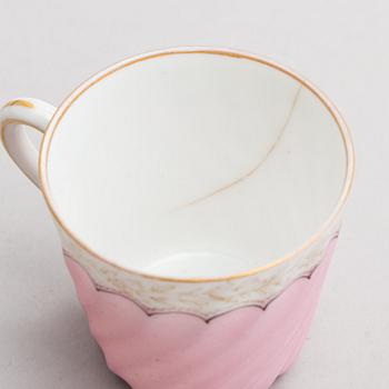 A Russian 18-piece coffee set in porcelain from M.S. Kuznetsov, manufactured in Riga, Russia 1864-1880.
