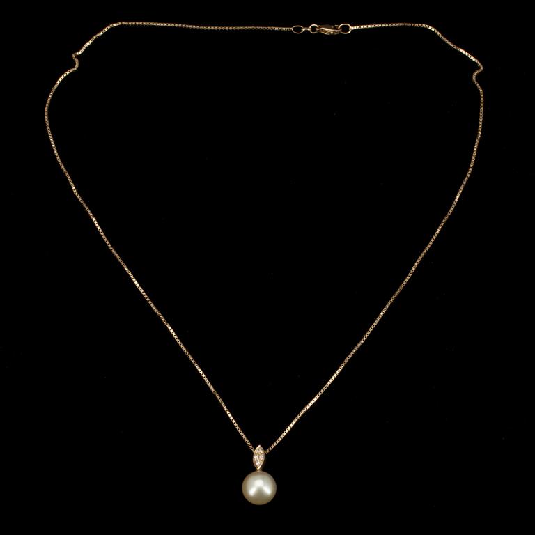 HÄNGE, 14K guld, söderhavspärla 10 mm. 4 st. diamanter ca 0.06 ct. Vikt 5,2 g inkl. ked.