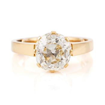 542. An 18K gold ring with an old-cut diamond.