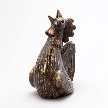 SAKARI VAPAAVUORI, a stoneware sculpture signed VSV Arabia.