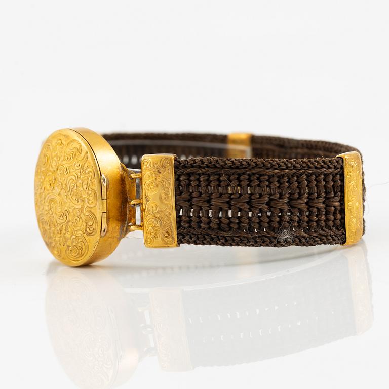 Armband hårarbete och 14K guld.