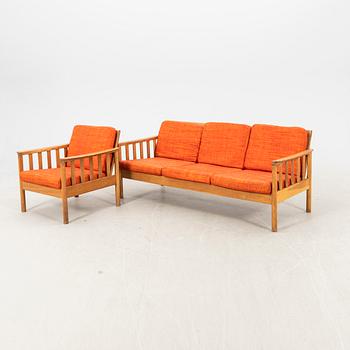 An oak easy chair ans sofa "Tiveden" by Gunnar Myrstrand & Sven Engström from the middle of the 20th century.