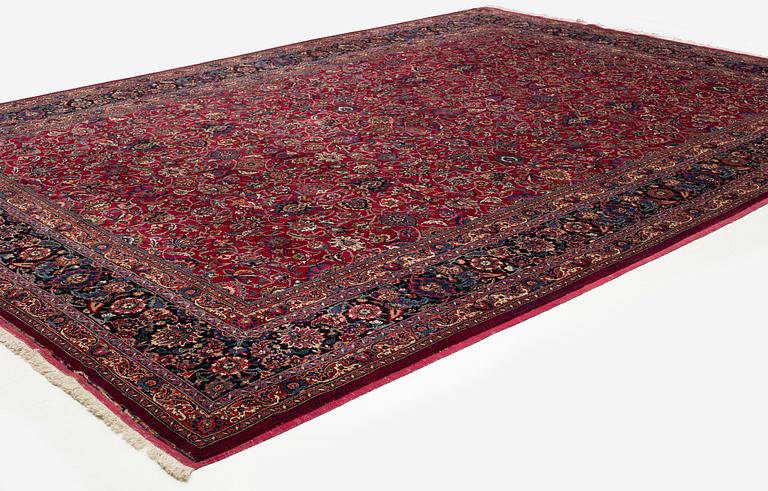 A semi-antique Mashad Saber carpet, north east Persia, ca 475 x 349 cm (including the flat weave).