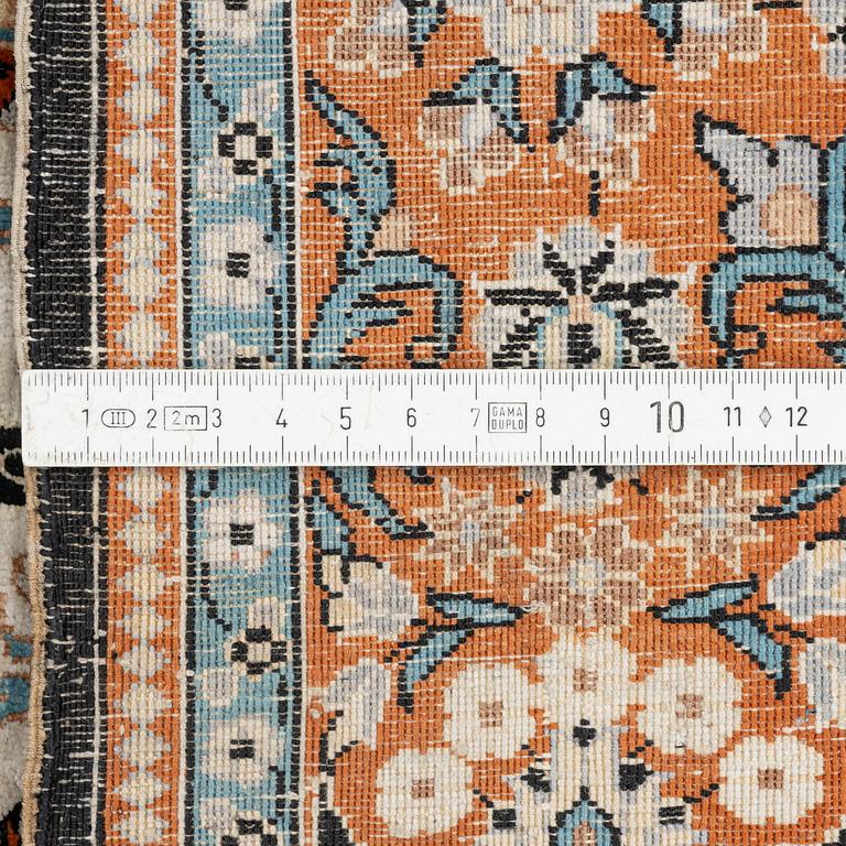 An oriental silk rug, probably China, c. 154 x 93 cm.