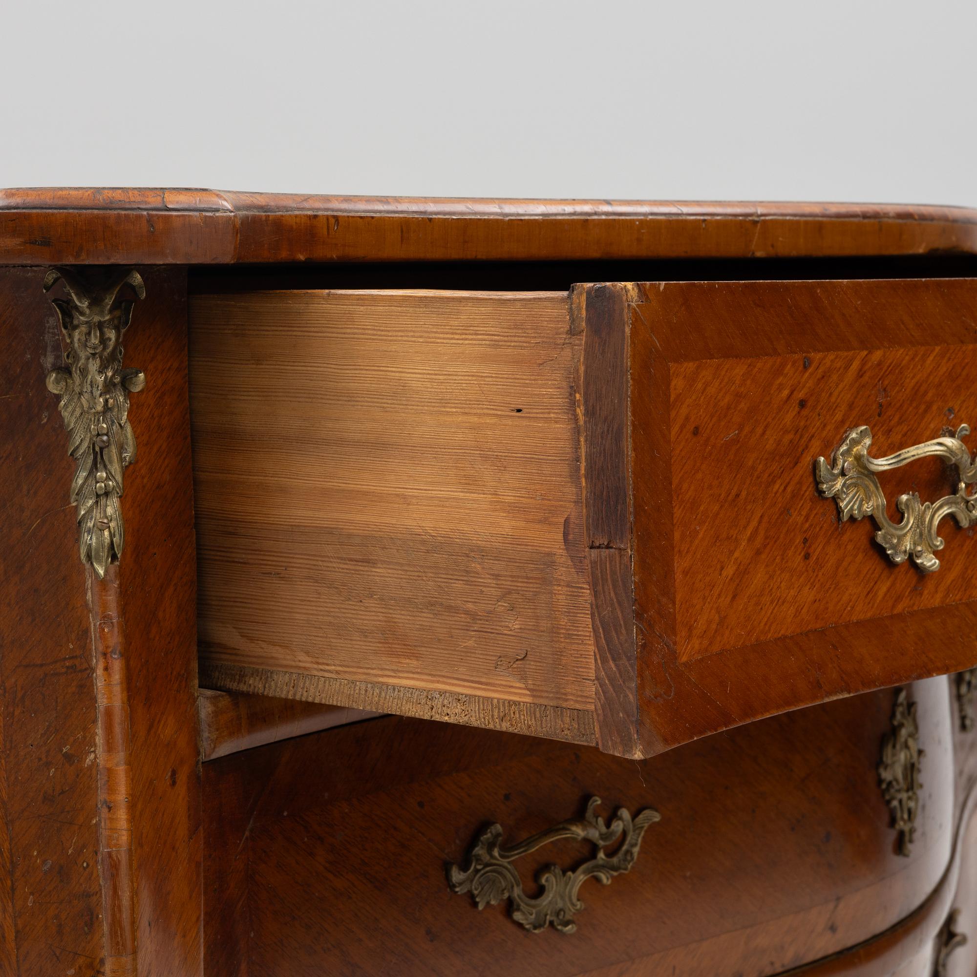 A Rococo chest of drawers, 18th Century.