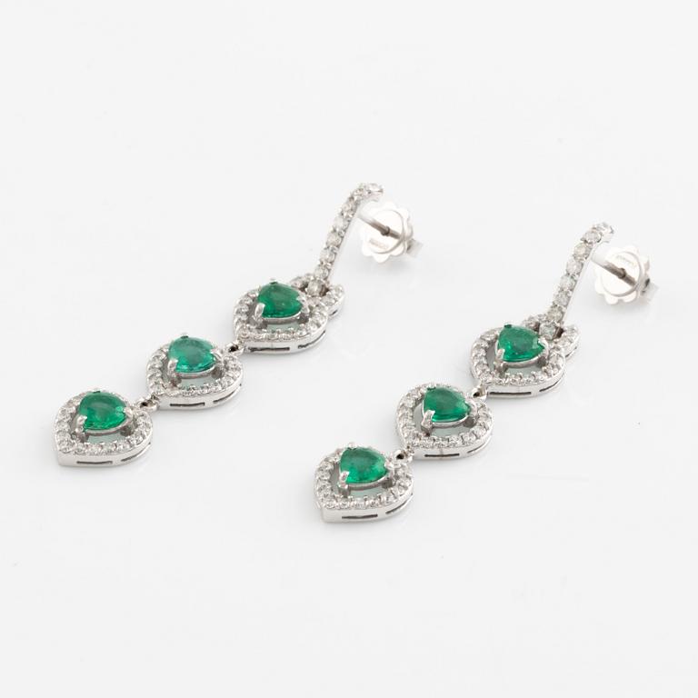 Emerald and brilliant cut diamond earrings.