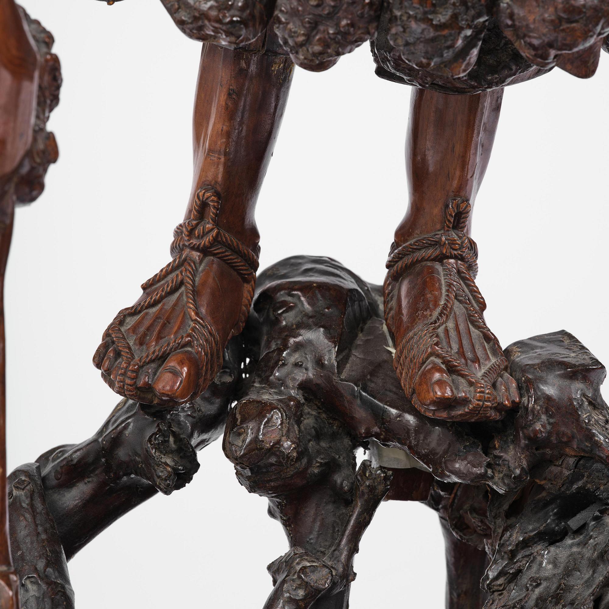 A large well sculptured root sculpture of 'Sholau and attendant', late Qing dynasty, 19th century.