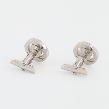 OMEGA, ett par manschettknappar.