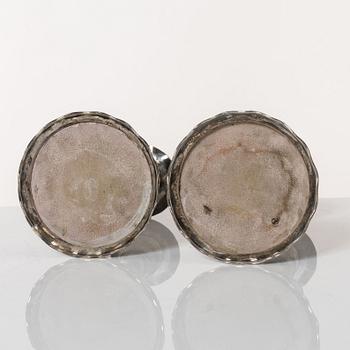 A pair of Baroque style silver candlesticks, marks of CG Hallberg, Stockholm 1942.
