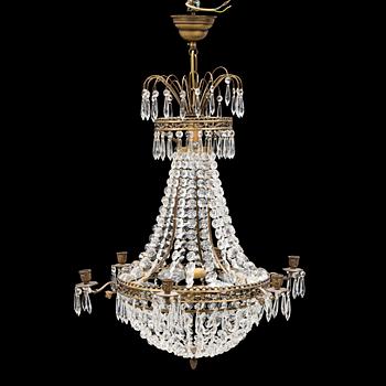 A CHANDELIER, empire-style, second half of the 20th century.