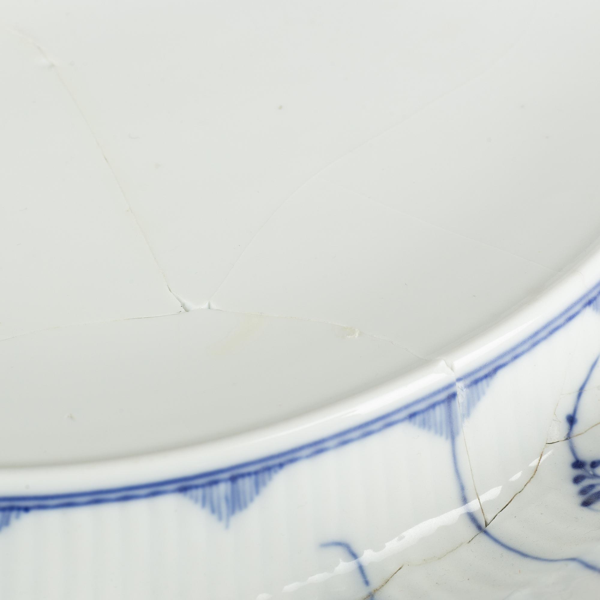 A 'Blue Fluted' porcelain tureen with cover and stand, Royal Copenhagen, early model, 19th century.
