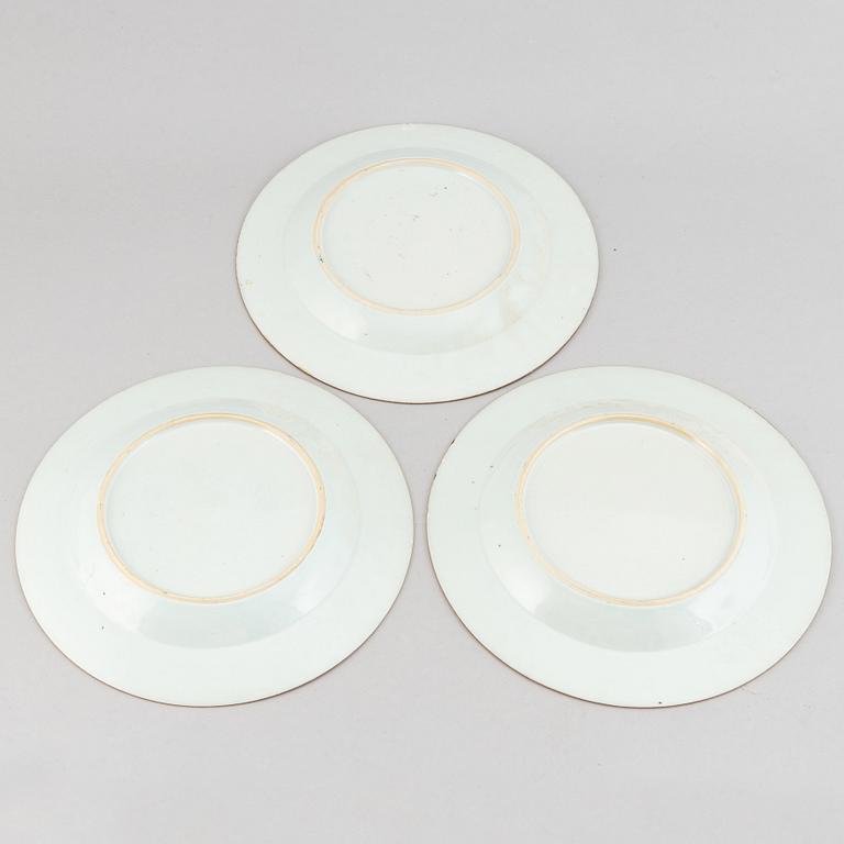 Three famille rose 'double peacock' plates, Qing dynasty, Qianlong (1736-95).