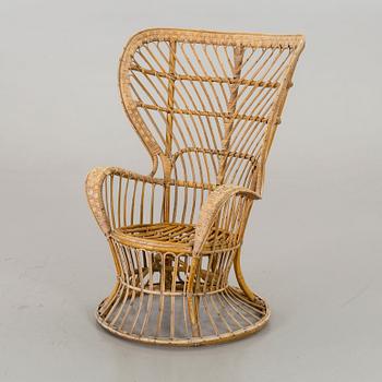 A GIO PONTI ARMCHAIR.