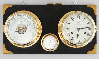 A barometer, clock and a hyglometer, 20th century.